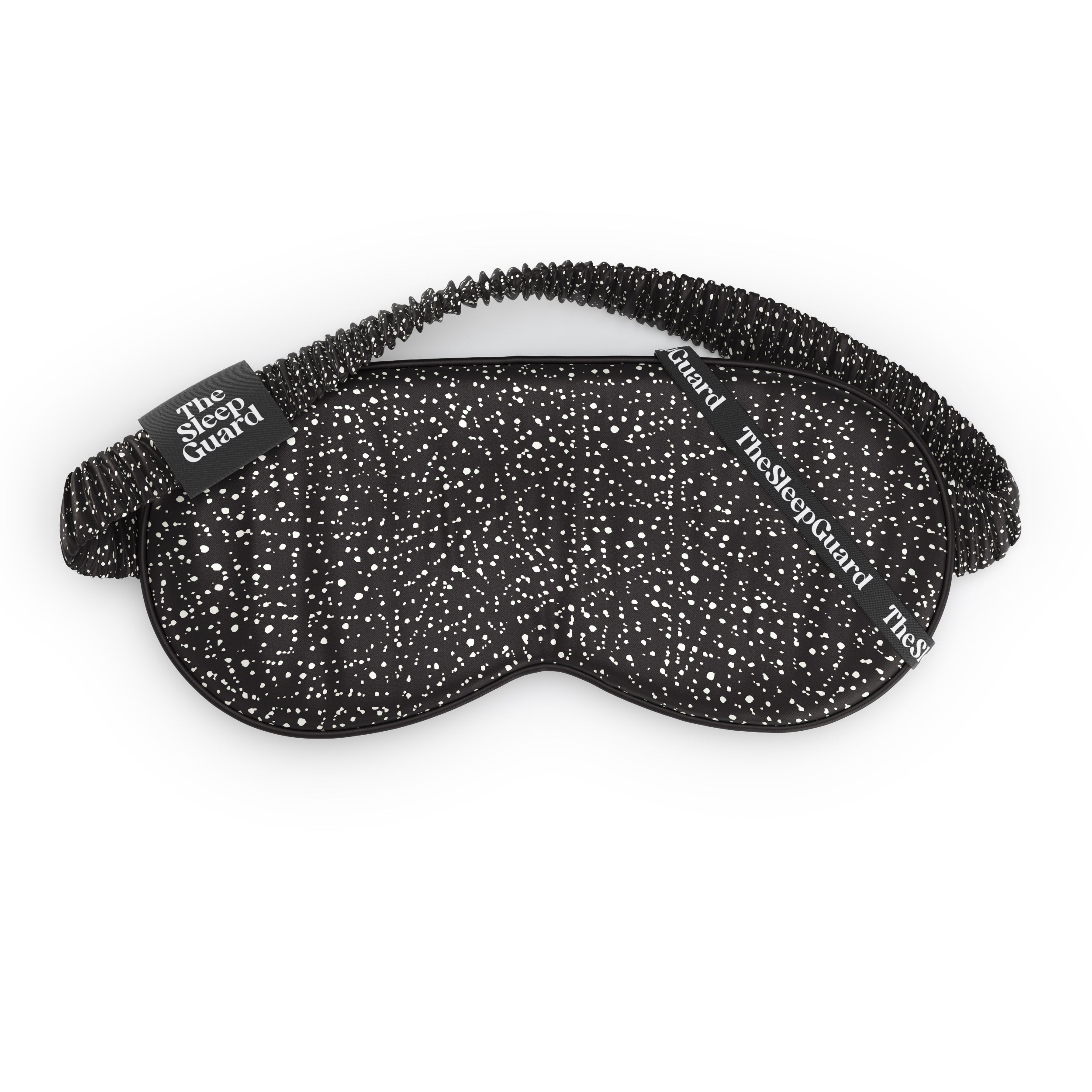 Black speckled starlight sleep mask with 'The Sleep Cloud' branding on a white background